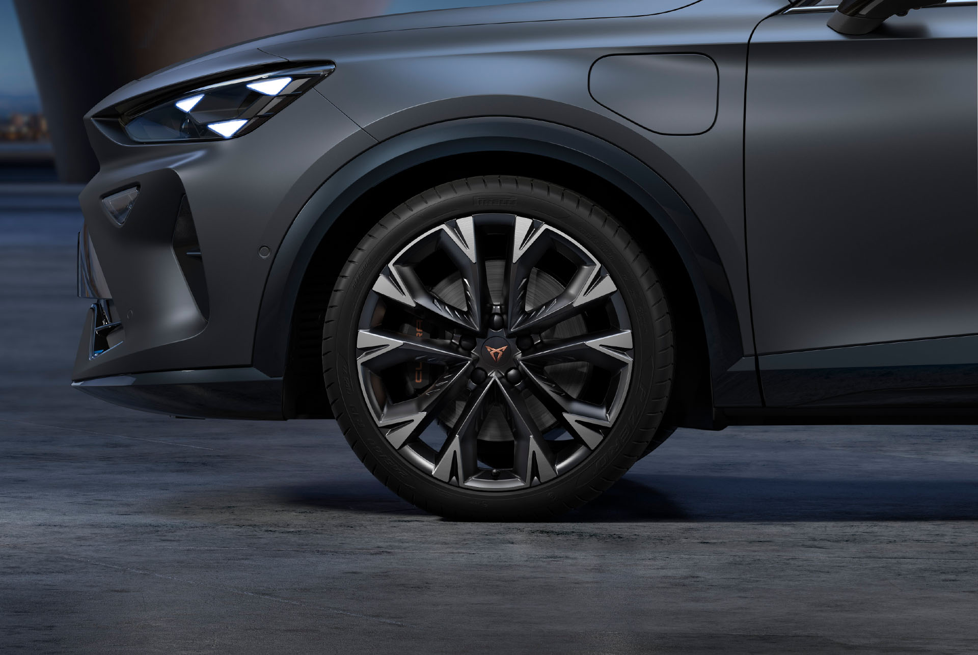 New artic silver and black CUPRA Formentor 2024 alloy car wheels, and tyres with logo in the middle, LED headlights.