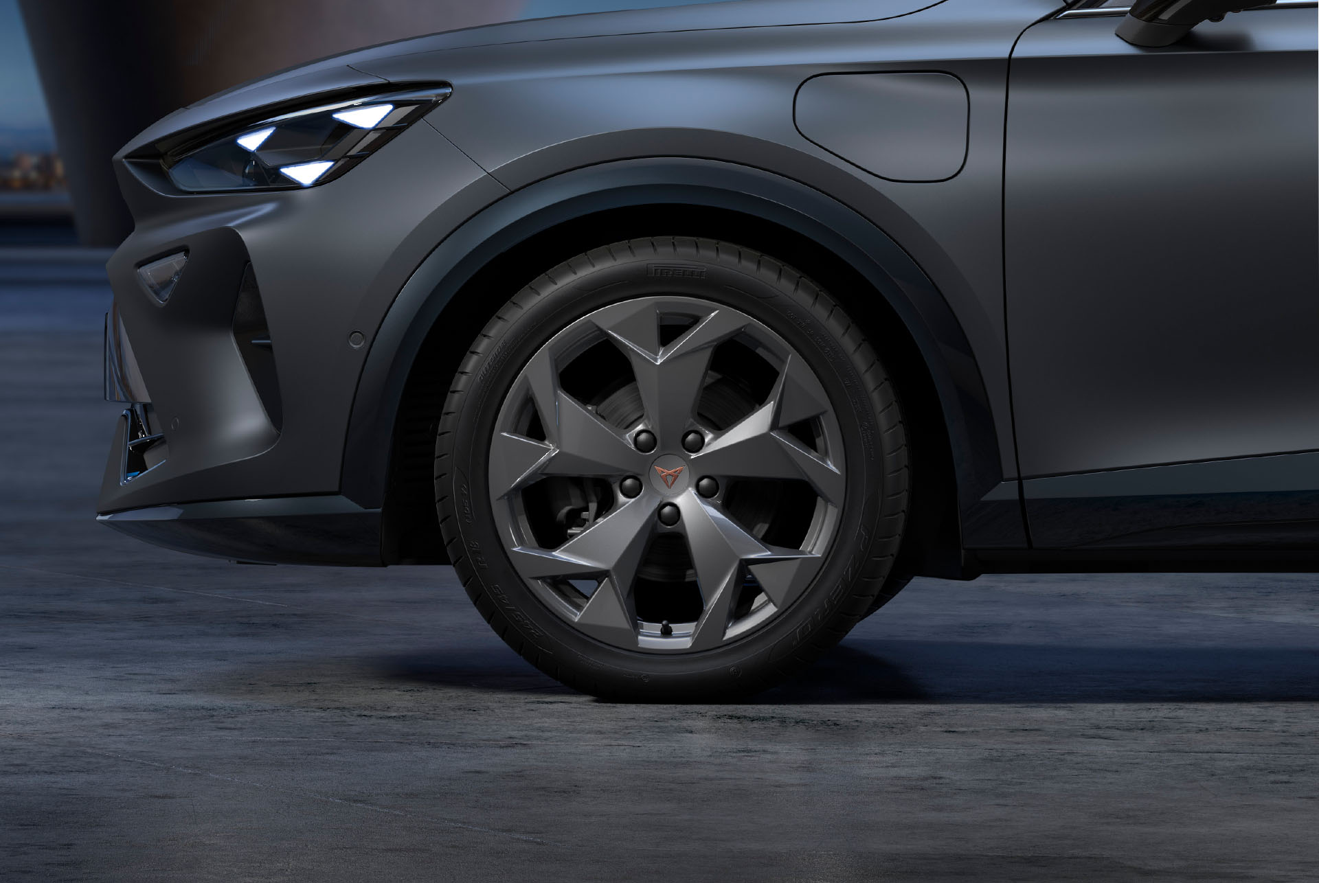 New tempest silver CUPRA Formentor 2024 alloy car wheels and tyres with logo in the middle, LED headlights.